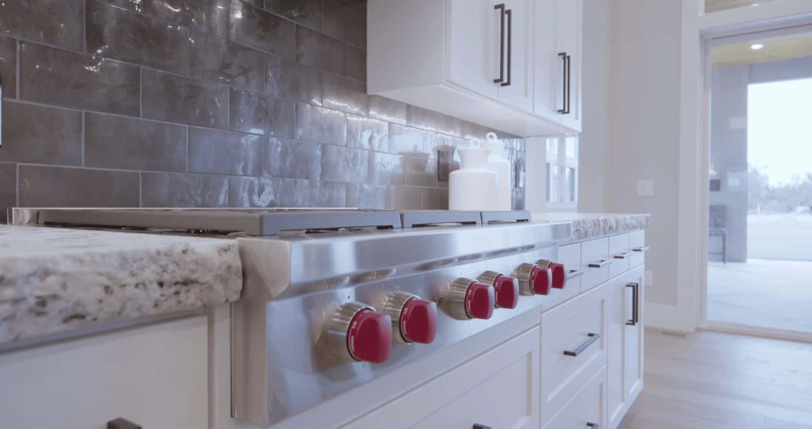 Professional kitchen deep cleaning services in Howell and Brighton, MI, featuring a spotless professional-grade stove and sanitized countertops by Fresh Start Residential Cleaning.
