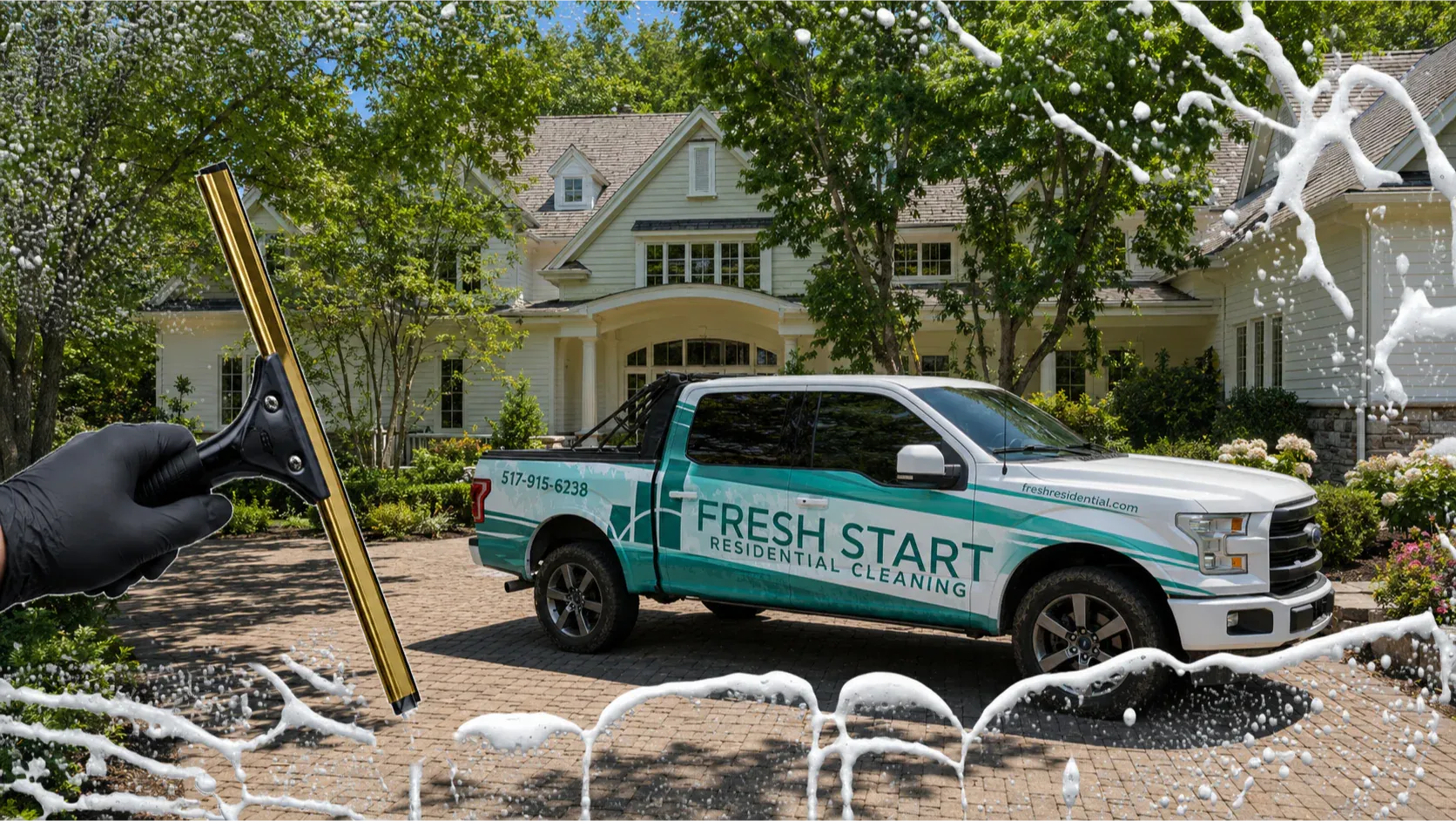 Fresh Start truck outside a home with a window-cleaning squeegee and soap in the foreground