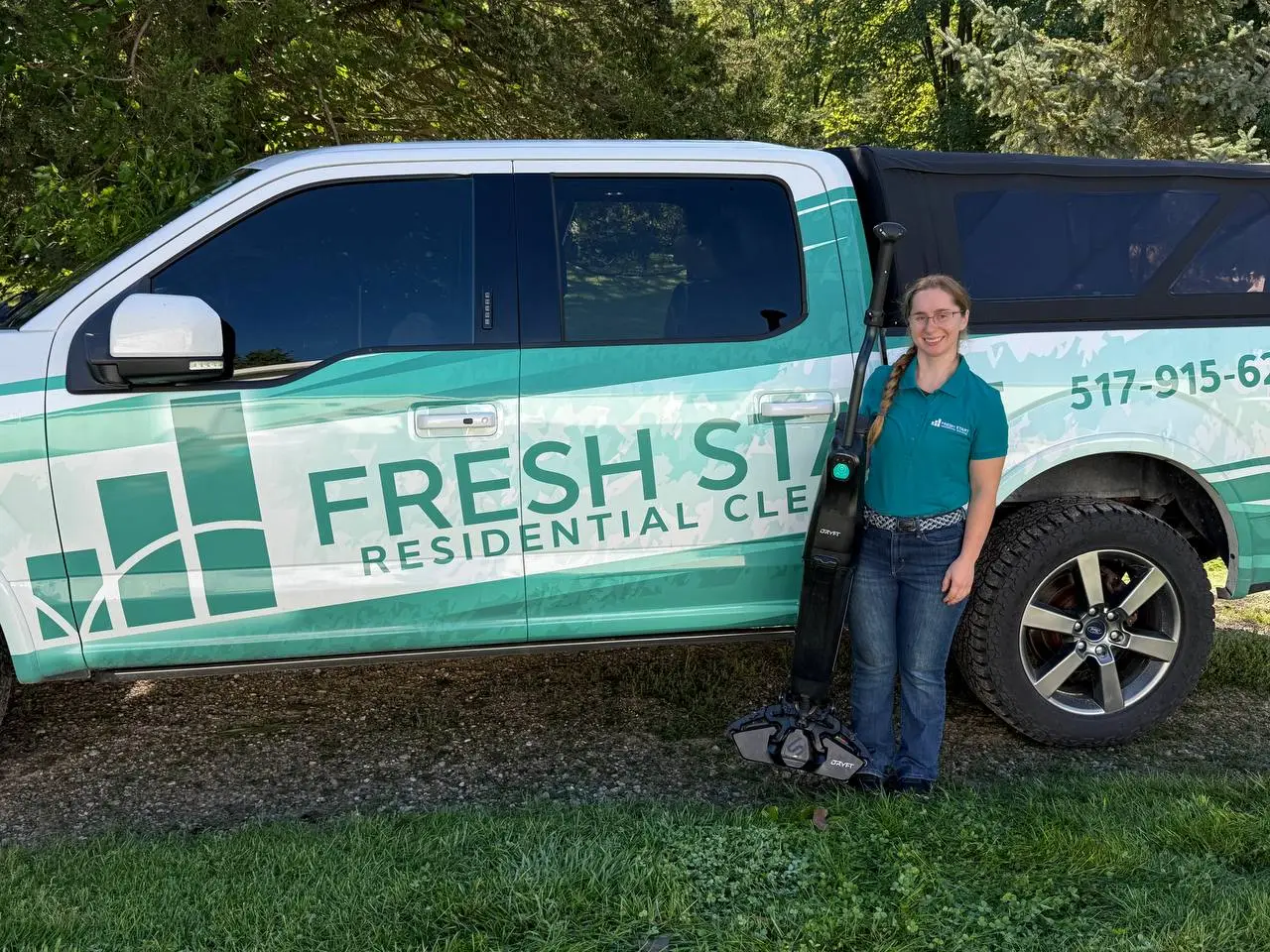 Melinda with Fresh Start’s DRYFT and branded service vehicle.